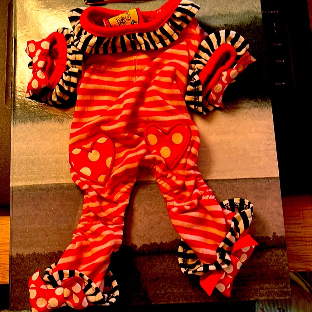 XS Red striped puppy one piece fancy outfit. Hearts on front with bows on paws